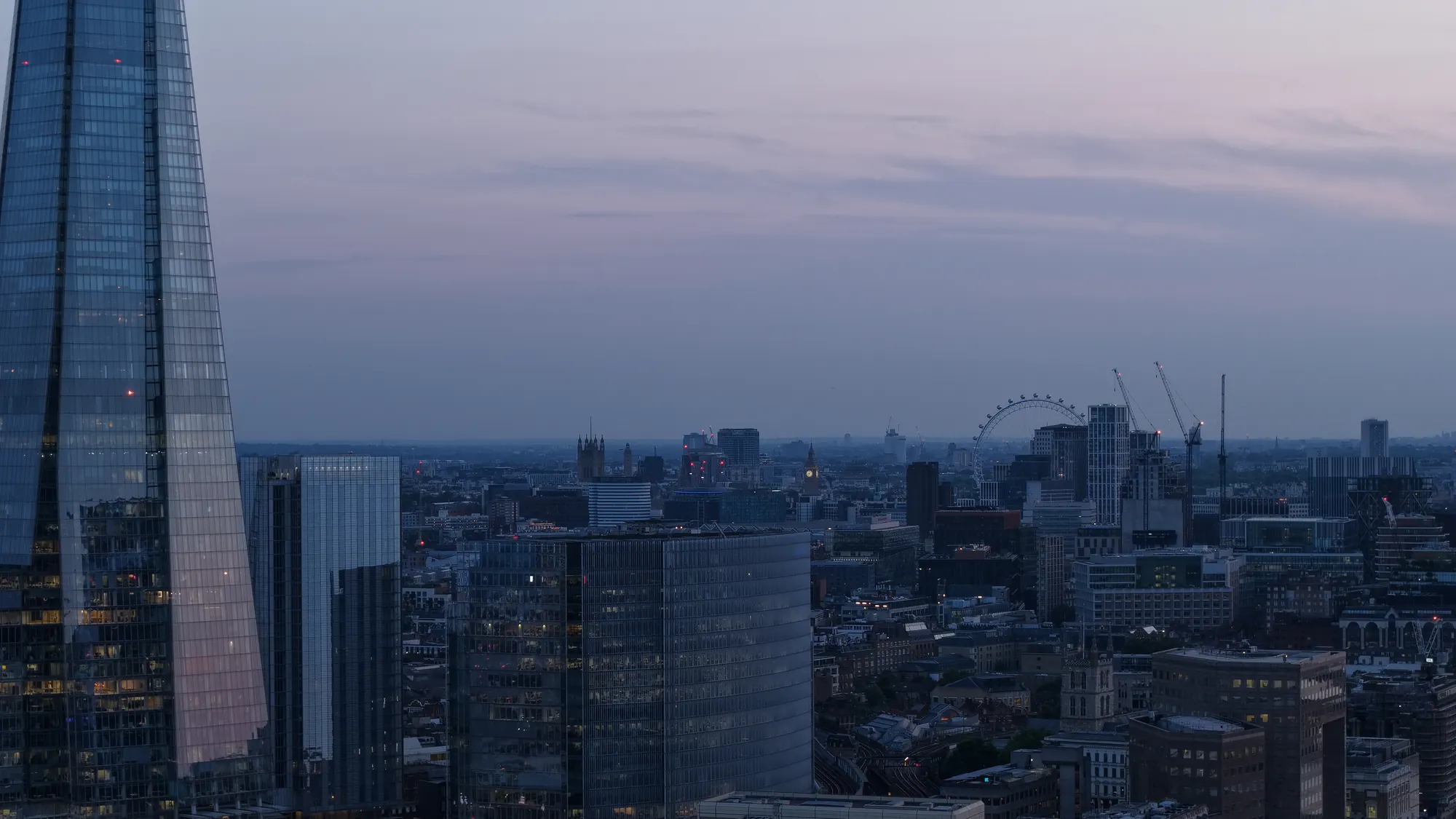 Aerial cityscape of London at dusk used for construction progress monitoring across the capital