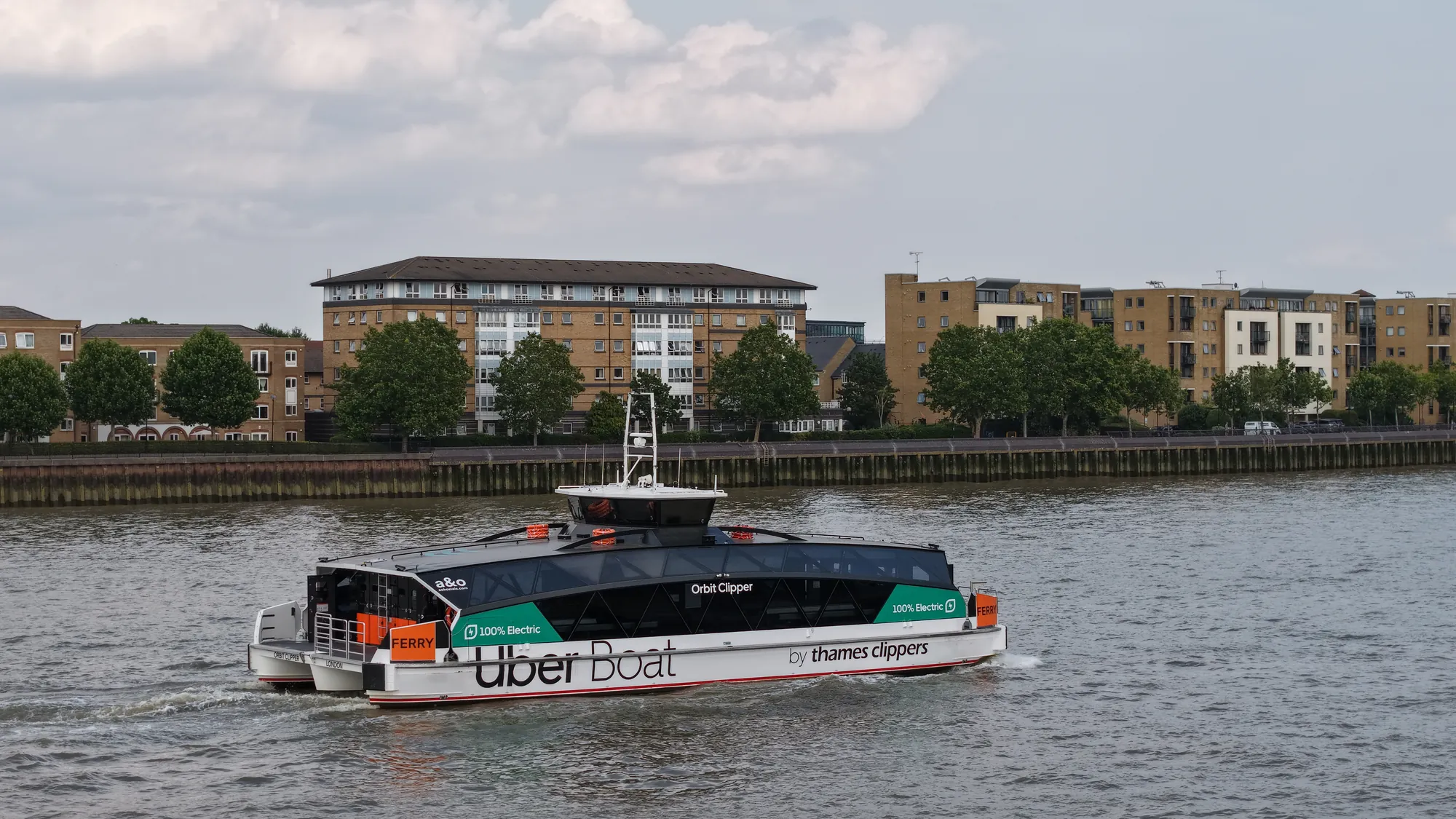 Uber Boat by Thames Clippers Orbit Clipper river service on the River Thames in London, aerial drone photograph
