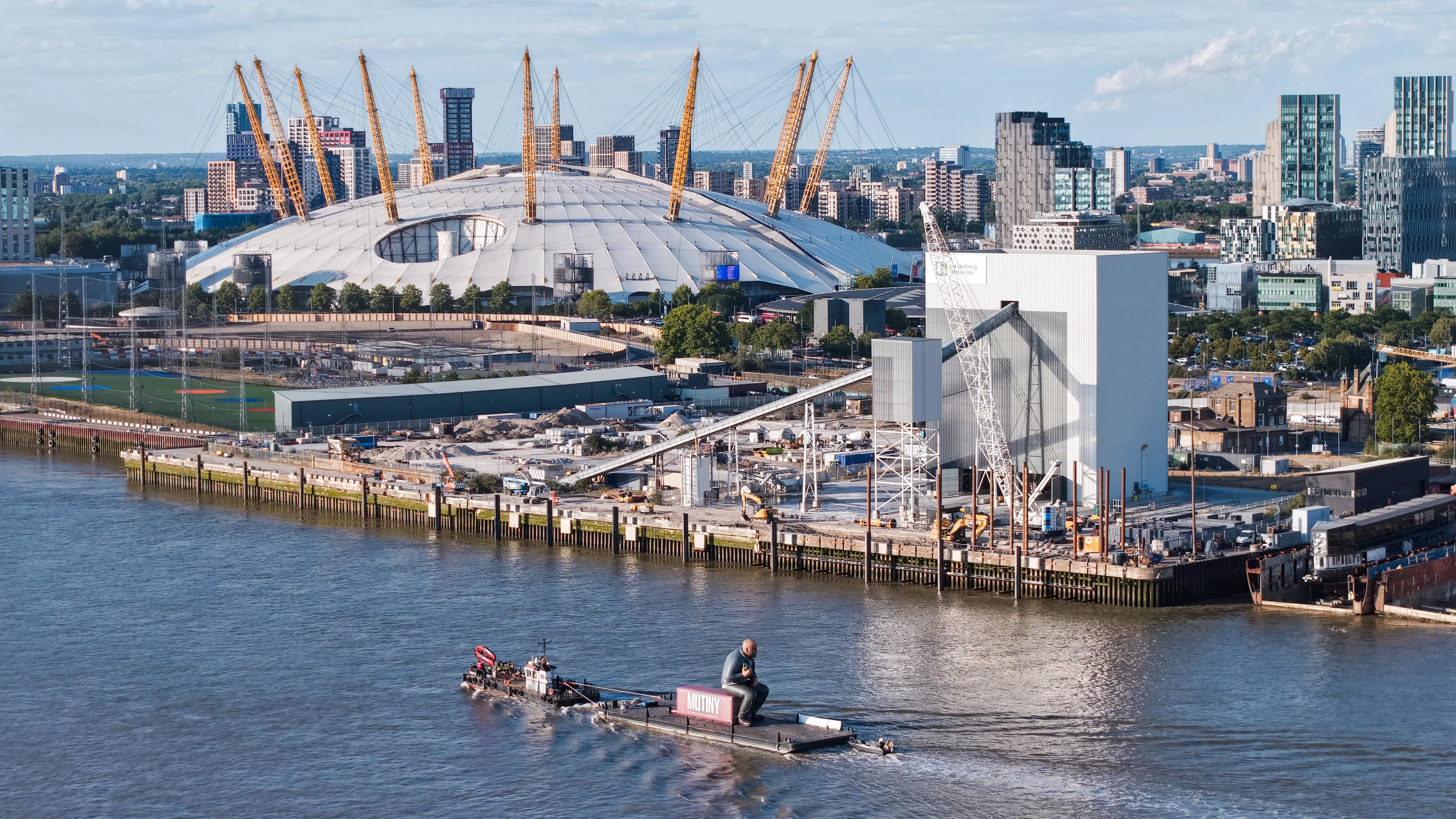 High aerial photograph of the Mutiny Thames brand activation with the O2 arena and the Greenwich Peninsula behind
