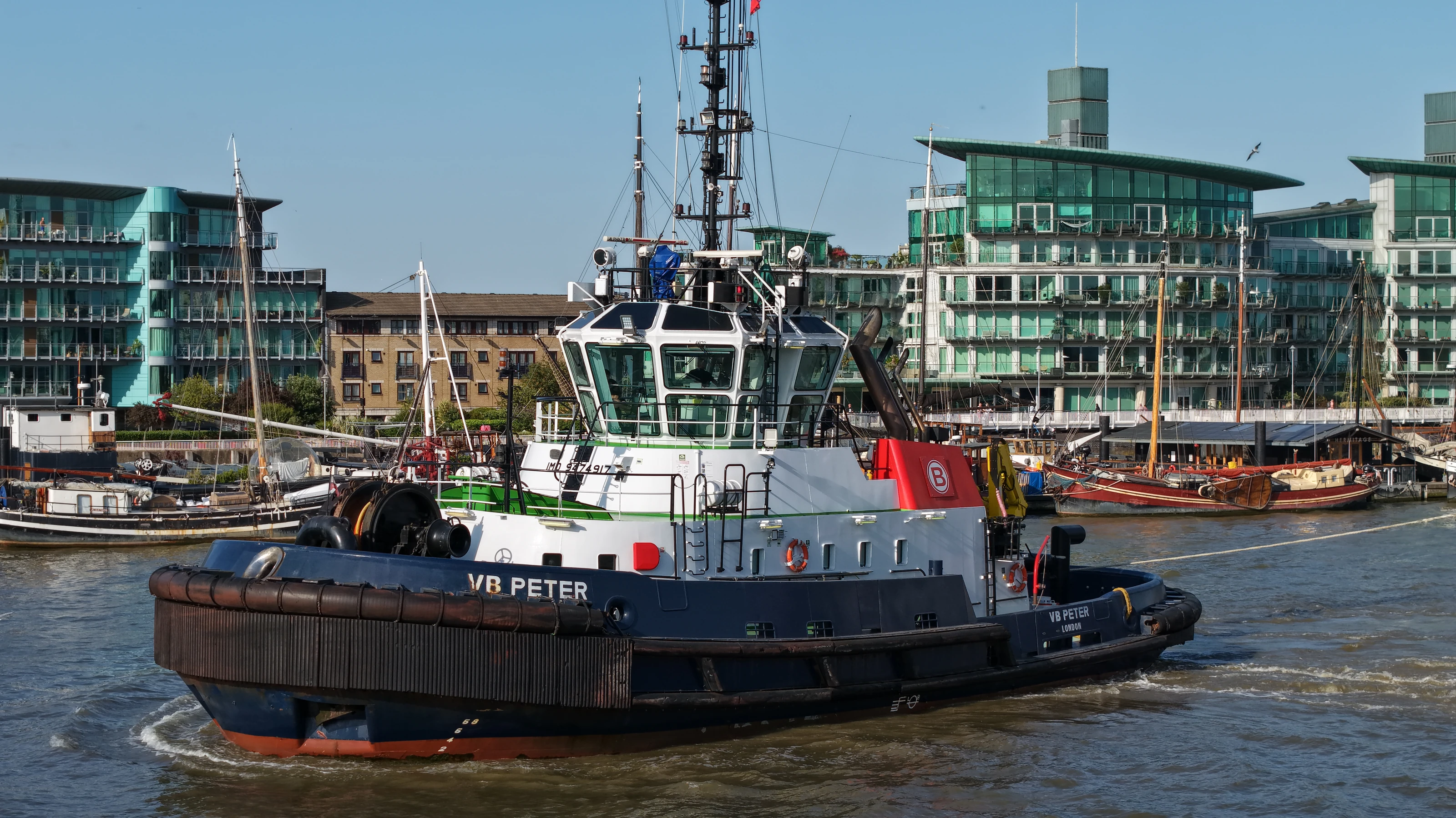 Boluda tugs working on the River Thames in London, photographed from the air.